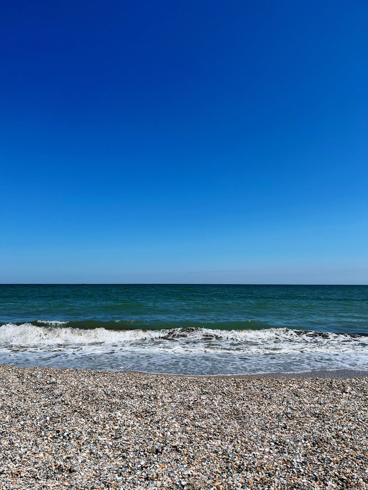 a rocky beach with waves